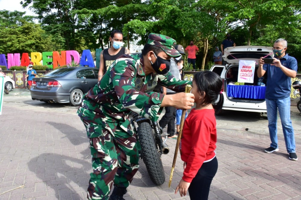 Tekan Penyebaran Covid-19, Jajaran Korem 091/ASN Bagi Masker